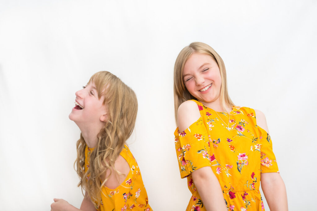 Two girls laughing - Family Session - Kind Words